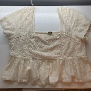 Cream colored American Eagle ruffled shirt. Size large.